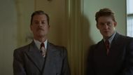 A still from "The Brutalist". In the scene: Guy Pearce & Joe Alwyn. (Image via. A24)